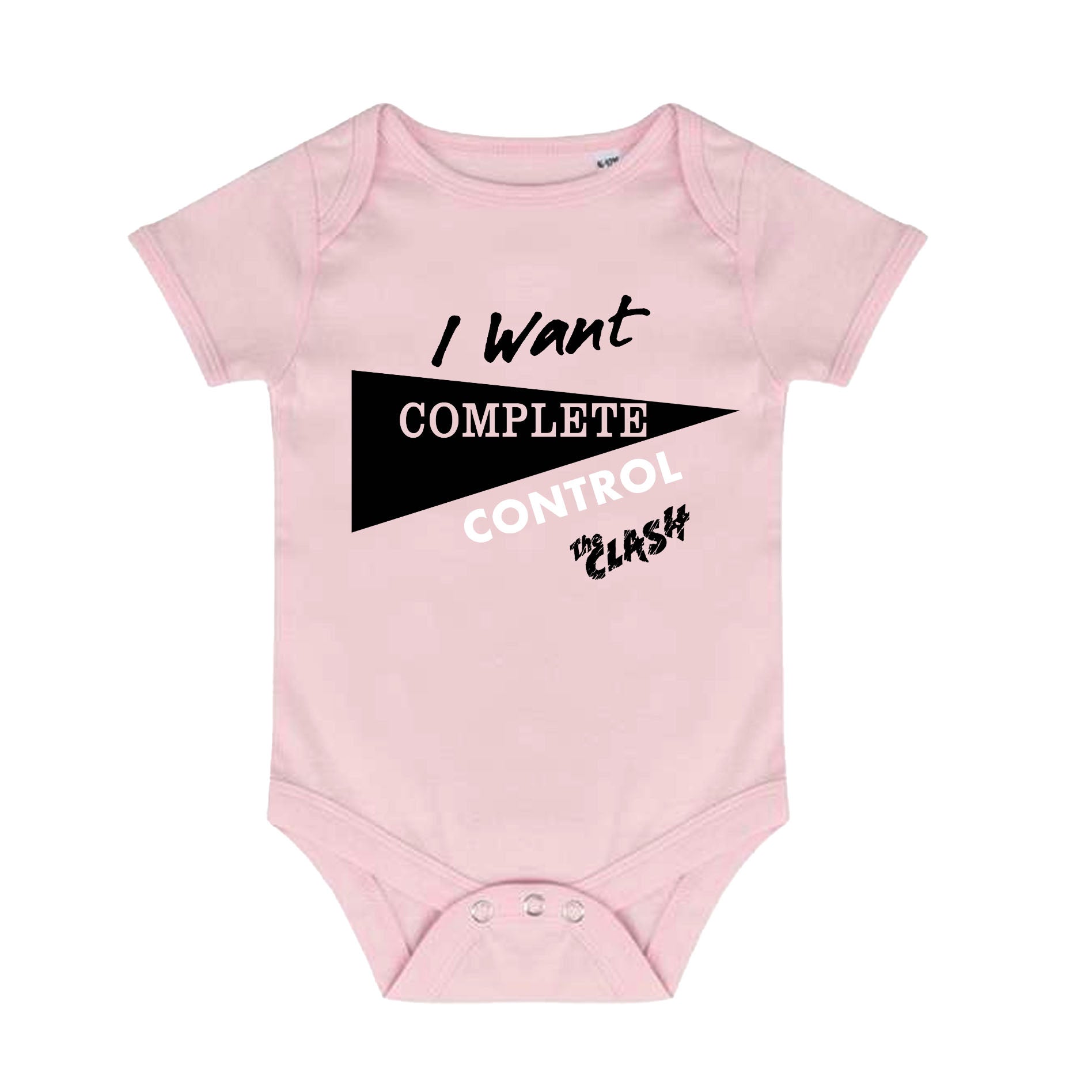 light pink baby grow with 'i want complete control' and the clash logo on the front, black triangle behind 'complete' poppers as the fastening 